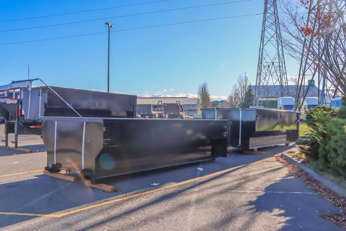 Roll-off dumpster ready for waste disposal at job site for 2 Yard Dumpster Rental in Johns Creek